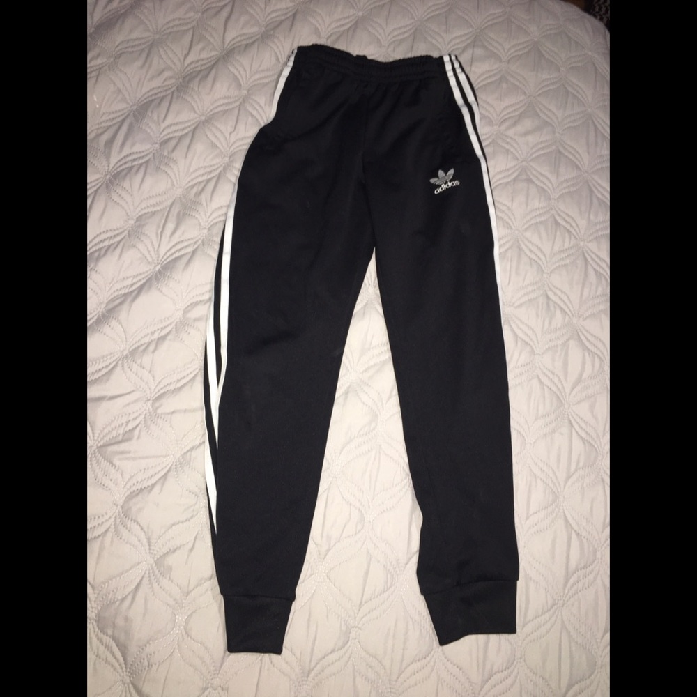 Black , white striped Adidas sweat pants